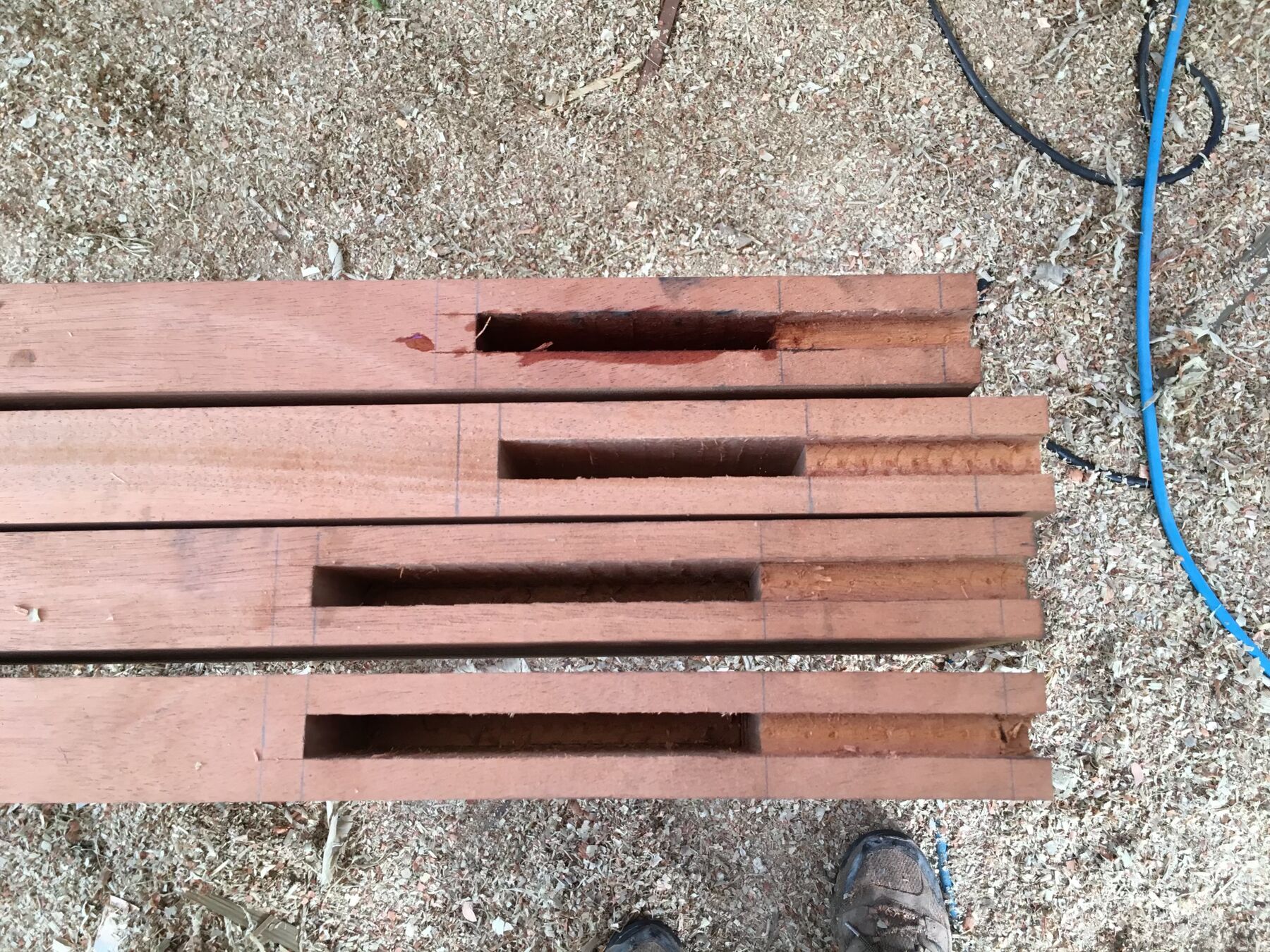 Hand-cut mortises in hardwood rails